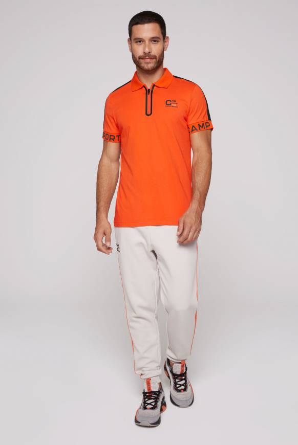 Soccx Poloshirt mit Zipper und kontrastvollen Prints signal orange Zeitbegrenzte Promotion