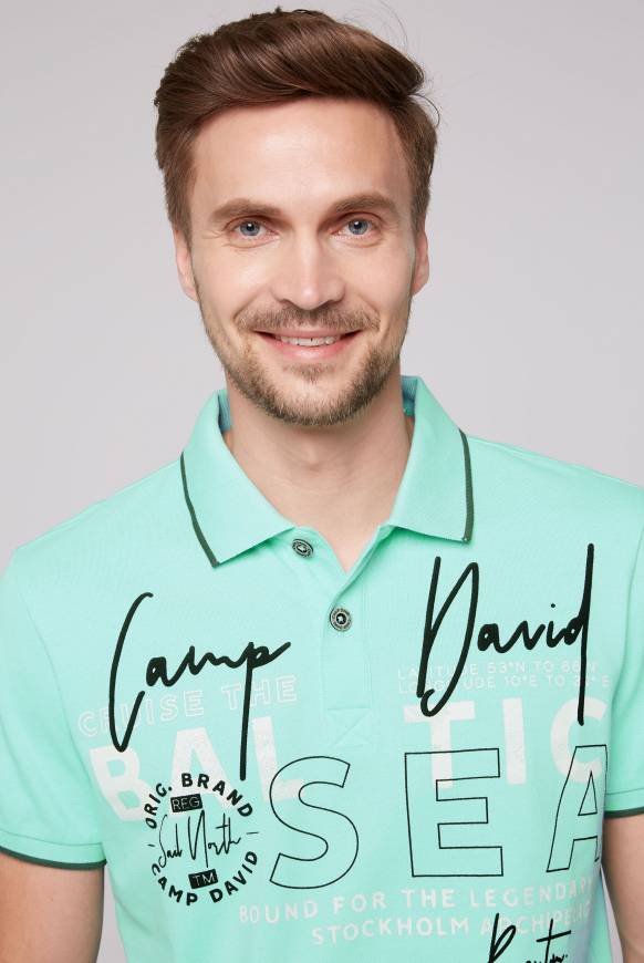Soccx Poloshirt aus Pikee mit Rubber Print flash aqua Sonderangebot der Fabrik