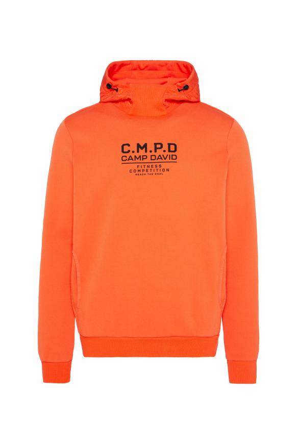 Soccx Hoodie im Materialmix mit Artwork und Rückentasche signal orange Im Verkauf