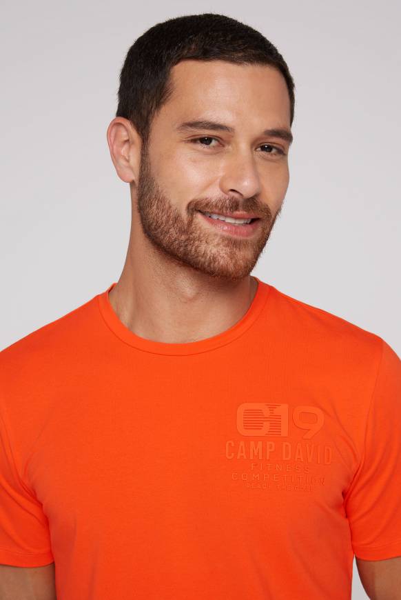 Soccx Sport-T-Shirt mit Artwork signal orange zollfrei
