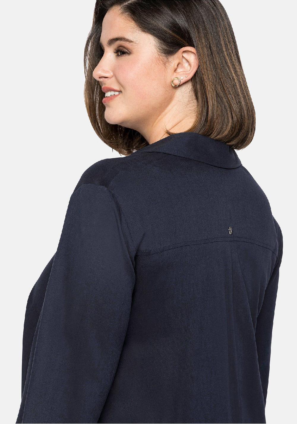 sheego Bluse mit asymmetrischem Saum in Zipfelform 2025